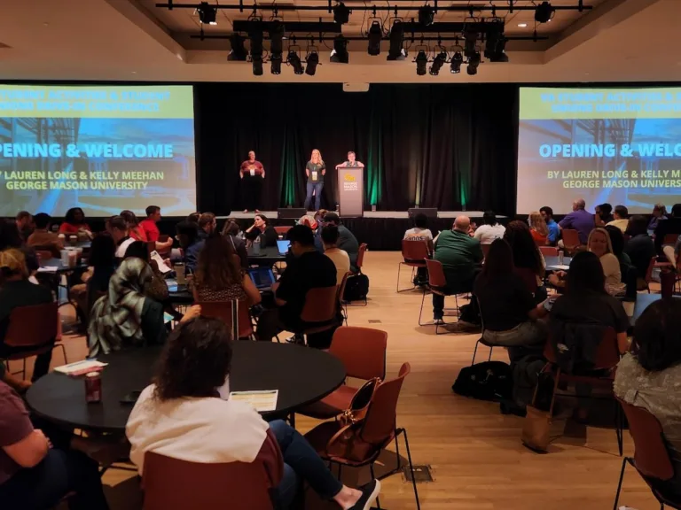 Photo of the professional staff memebers from Virginia colleges at the Dewberry Hall attending the Drive-in conference.